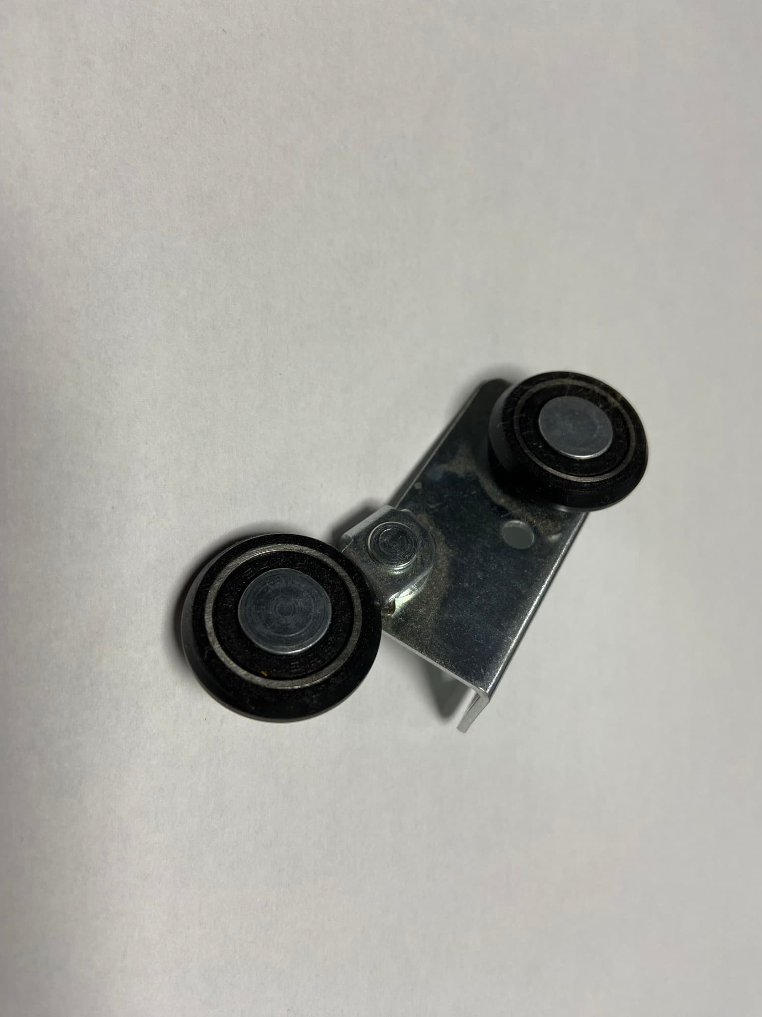 bild von Führungsrolle oben mit Feder (Lamellentüren)